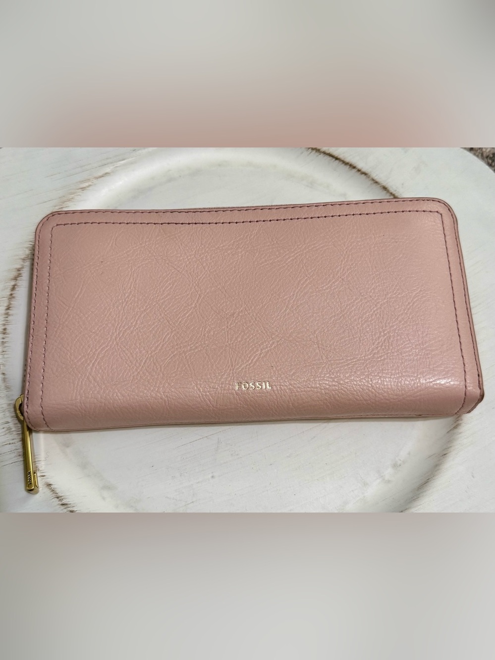 Fossil  light pink  zip-around wallet with pink and red polka dot interior